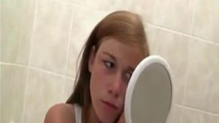 Teen masturbating in the toilet