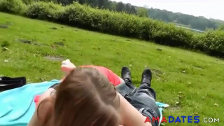 Red skirted girl rides her guy to creampie in public park