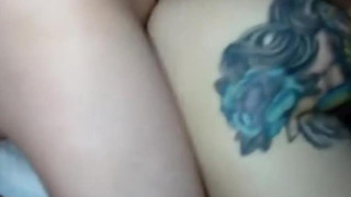 Tattooed chick rides anal