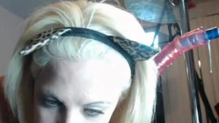 crazy girl takes a dildo all the way down her throat