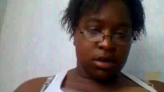 Ebony shows big tits on webcam