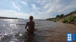 I swim naked on the river
