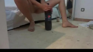 Teen fucks huge Pepsi bottle